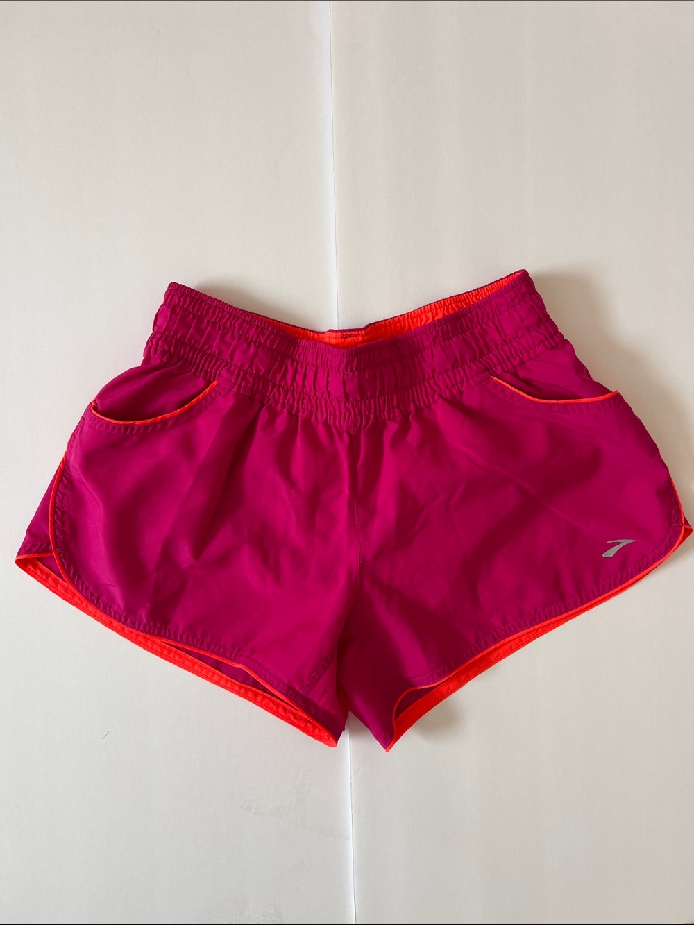 Brooks Women's Bright Pink Athletic Shorts with Orange Trim